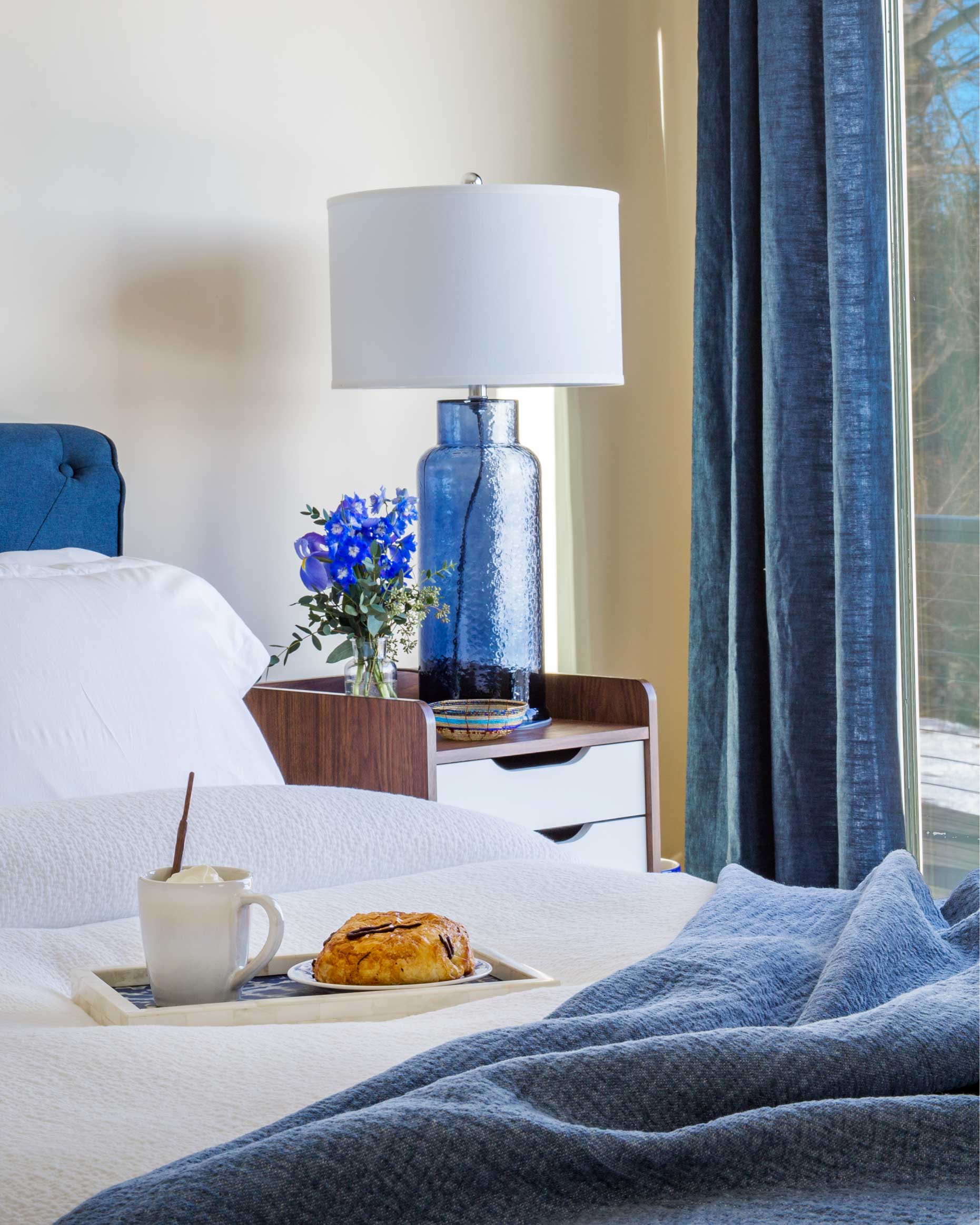 Stay in bed while! Lake views and soft organic bedding will make you want to linger.