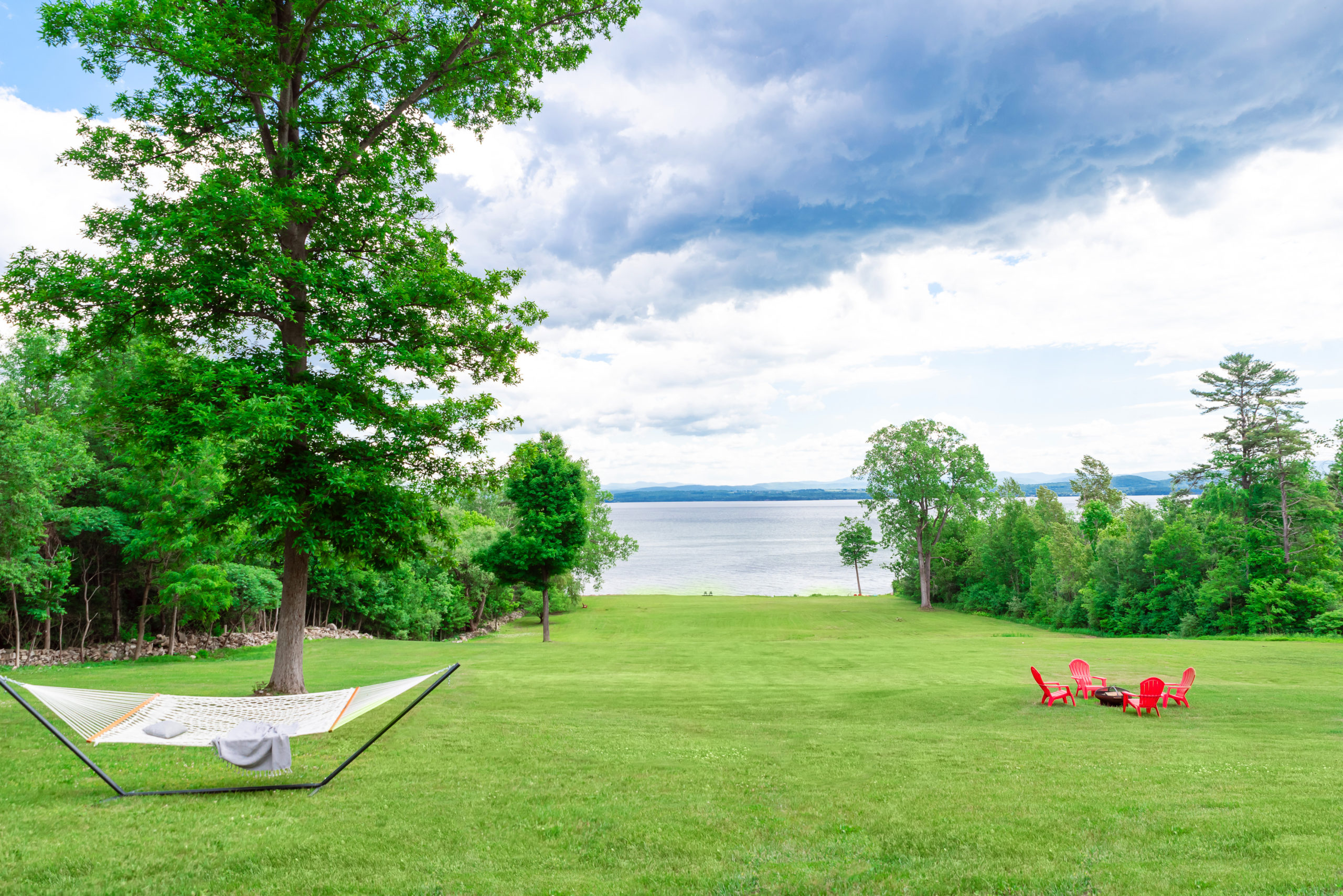 Paradise found! Lake Champlain (and Vermont’s Green Mountains) at the bottom of a long private lawn.